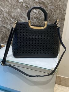 Graceful black Cut Work Women Handbag