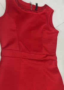 Elegant Red Dress with Embellished Neckline