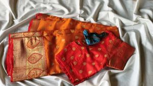 Elegant Orange Silk Saree with Golden Zari