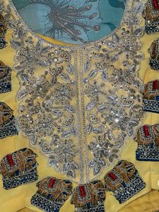 Elegant Yellow Saree with Elephant Motif