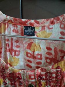 Elegant Printed Kurta with Embellished Neckline