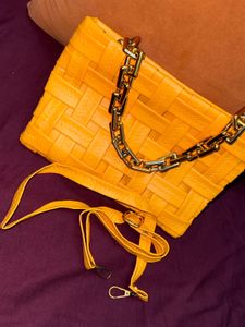 Vibrant Yellow Woven Clutch with Chain Strap