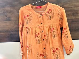 Orange Printed A-Line Top | Flowy Kurti Style