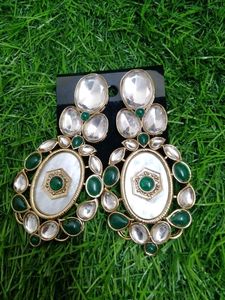 Elegant Oval Earrings with Green Stones