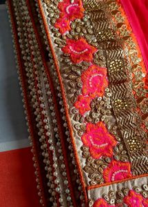 Beautiful Embroidered Red Saree with Orange Blouse