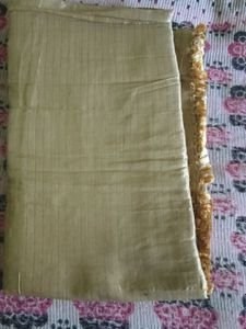 Elegant Gold Striped Fabric with Tassel Trim