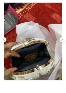 Embellished Round Clutch with Tassel
