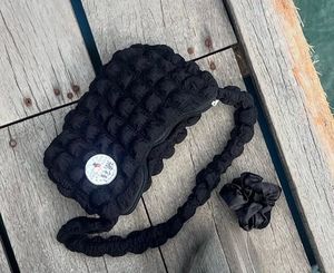 Chic Textured Shoulder Bag with Matching Scrunchie