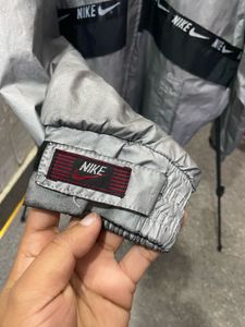 nike lightweight silver jacket