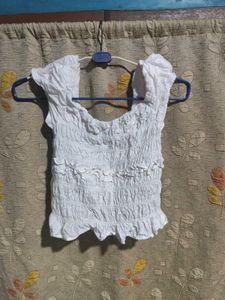 white smocked ruffle crop top