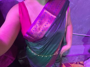 Elegant Dark Green Saree with Pink Blouse