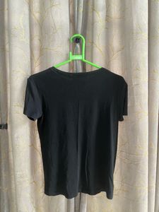 Black T-Shirt with White Heart Graphic