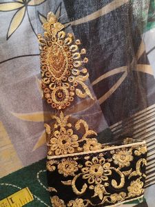 Elegant Black Blouse with Golden Embellishments
