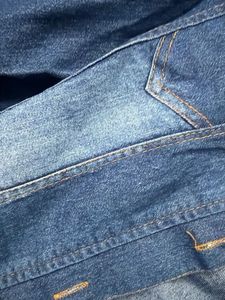 Denim Jacket with Frayed Edges