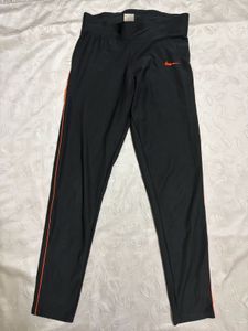 Nike Black Athletic Pants with Orange Stripe