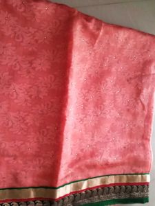 Beautiful netted peach colour Saree