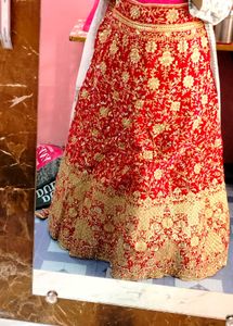 Rani pink Embroidered Lehenga Choli