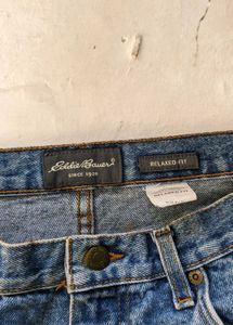 Distressed Blue Denim Jeans
