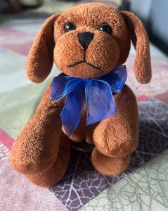 Cute Brown Plush Dog Toy with Blue Bow