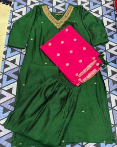 Elegant Green Kurta with Embellished Neckline