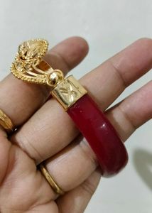 Brand new Gold Bangle with Red Accents