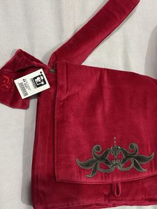 Velvet handbag with embroidery