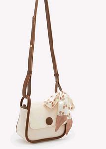 Chic Cream Crossbody Bag with Scarf Accent