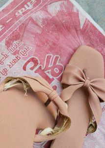 Women's Peach Flats With Bow Detail