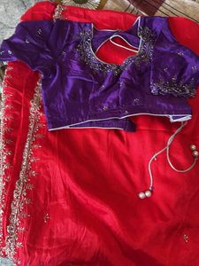 Red Saree with Purple Blouse
