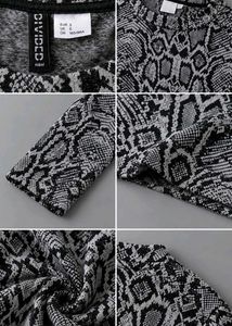BLACK &amp; WHITE ABSTRACT PRINT SWEATER