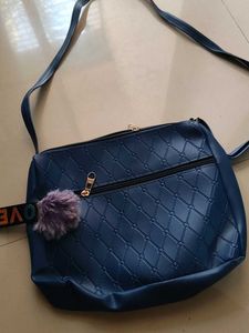 Stylish Blue Crossbody Bag with Pom-Pom