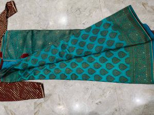 Elegant Teal Embroidered Saree