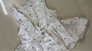 cute polka dot V neck top.