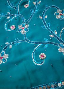 Stunning Teal Saree with Embellishments