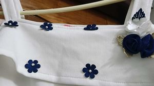 Cute White Top with Floral Embellishments