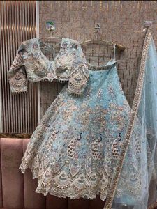 Exquisite Peacock Embellished Lehenga