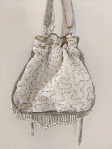 Silver Tassels Potli - Factory reject