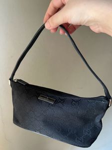 Gucci Monogram boat pochette bag