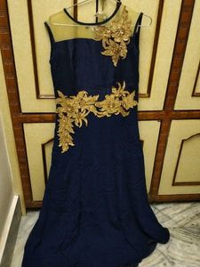 Elegant Navy Blue Dress with Gold Embellishments