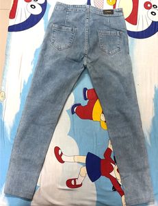 High Weist Light Wash Ripped Jeans