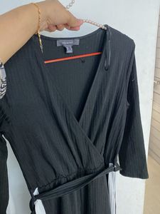 Chic Black Jumpsuit with White Stripes