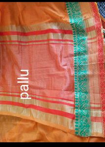 Vibrant Orange Saree with Green Border