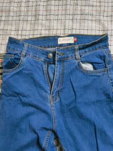 Blue Denim Jeans with Frayed Hem