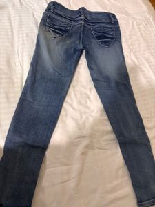 Distressed Blue Denim Jeans