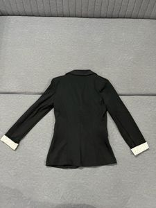 Classic Black Blazer with Polka Dot Lining