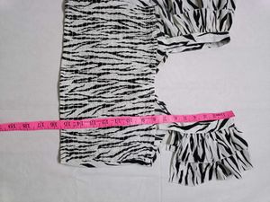 ANI Zebra Print Smocked Ruffle Top