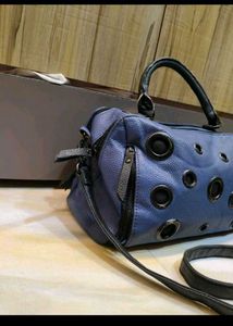 Blue Handbag with Eyelet Detail