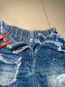 Distressed Denim Shorts with Embellishments