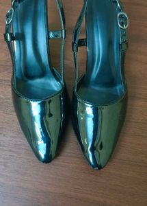 Black pointed heels with adjustable band