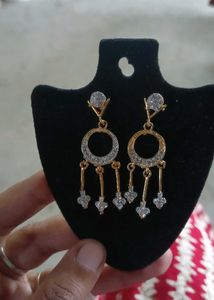 Elegant Gold Toned Dangle Earrings